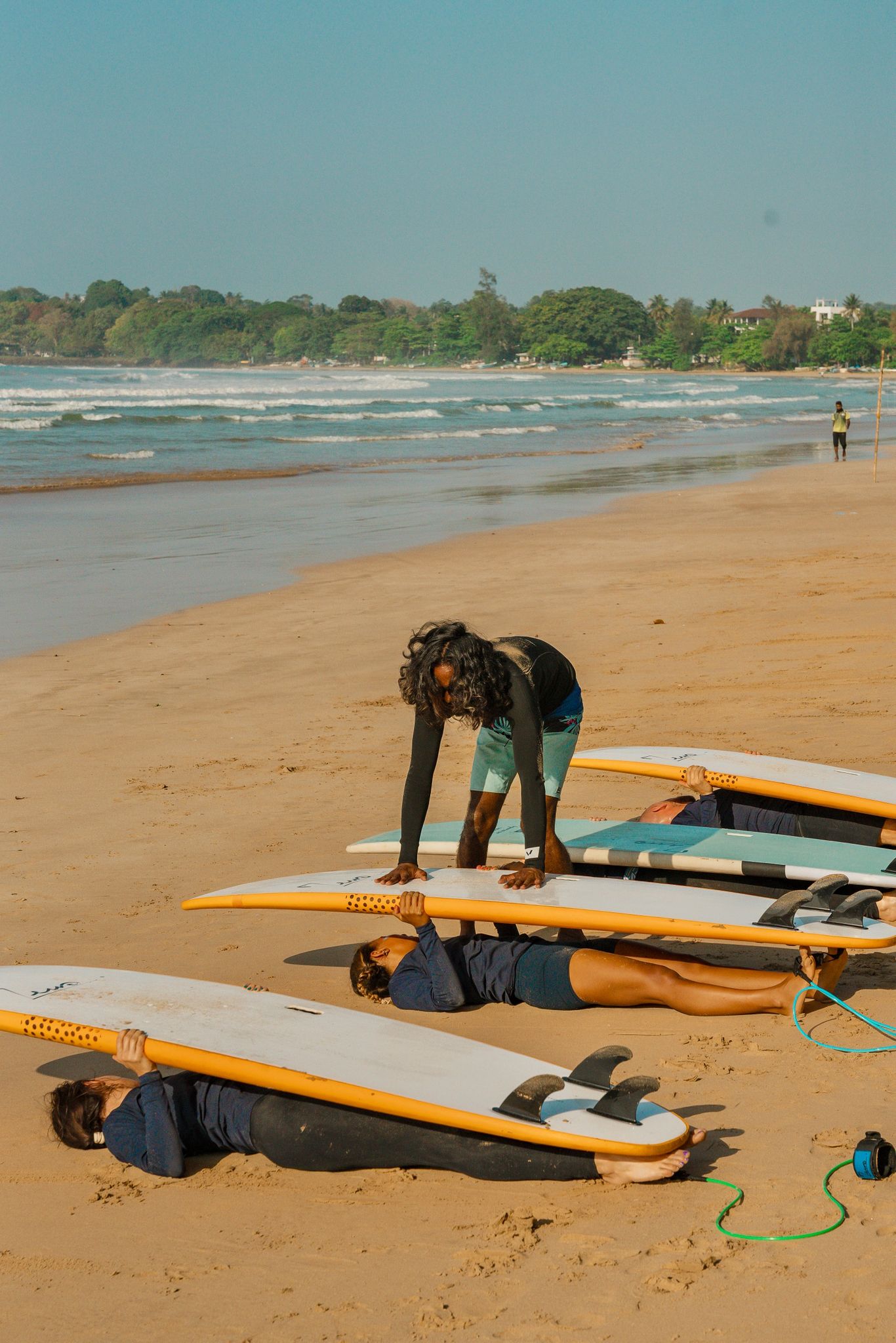 Surfer riding a perfect wave in Arugam Bay